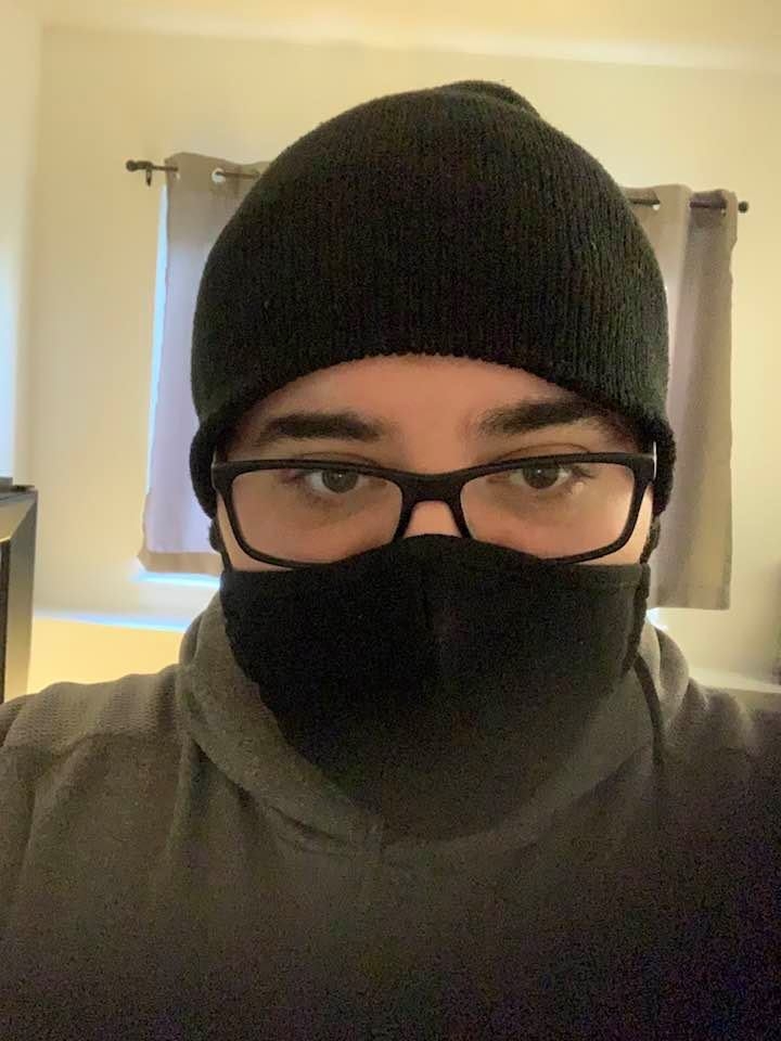 Selfie of me wearing a black mask and black winter beanie cap